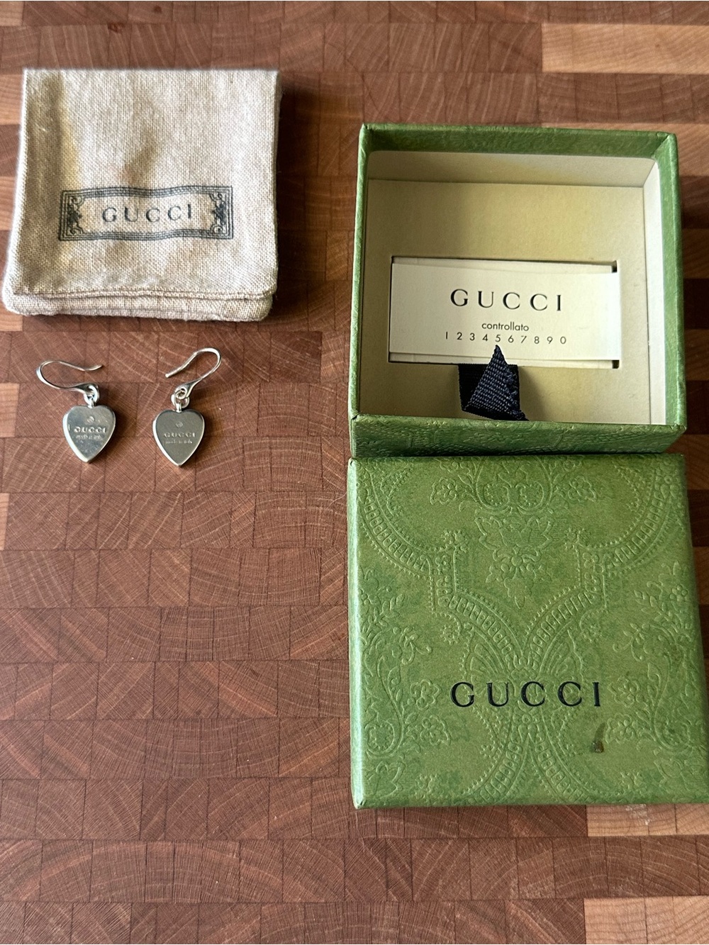 Gucci silver heart earrings
